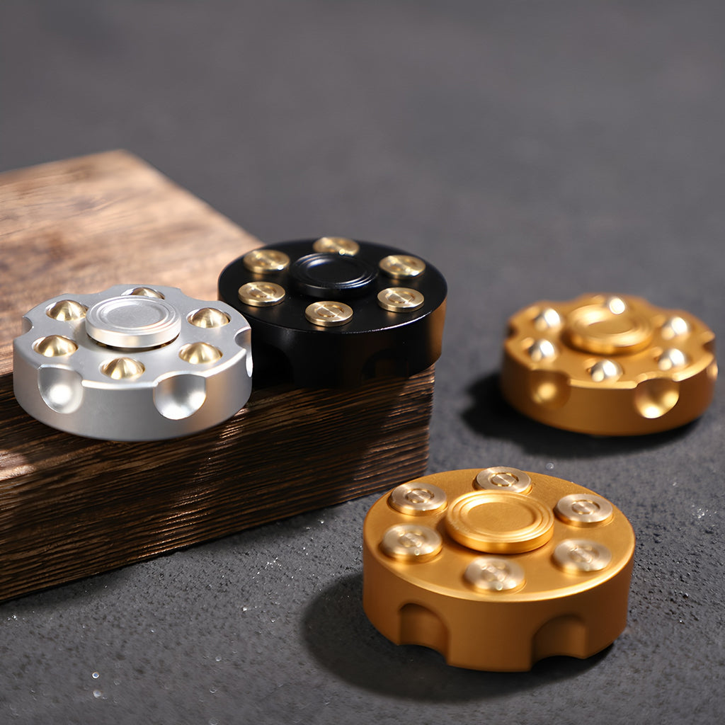 Revolver fingertip spinner